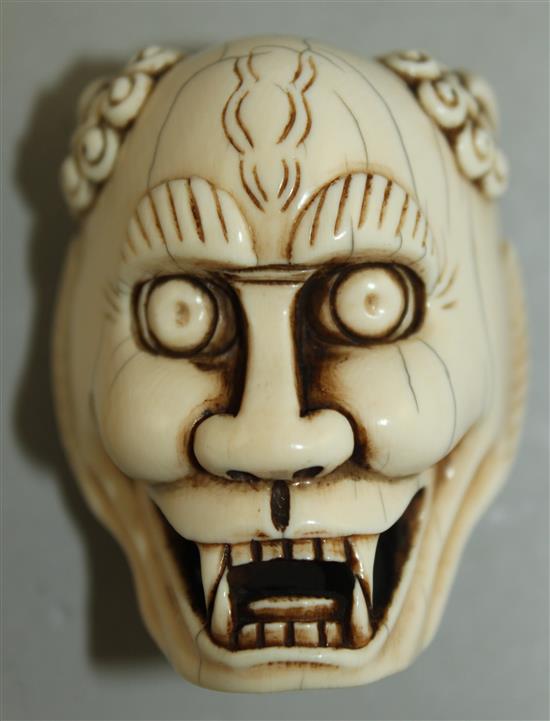 A Japanese ivory oni noh mask, early 20th century, 5.3cm